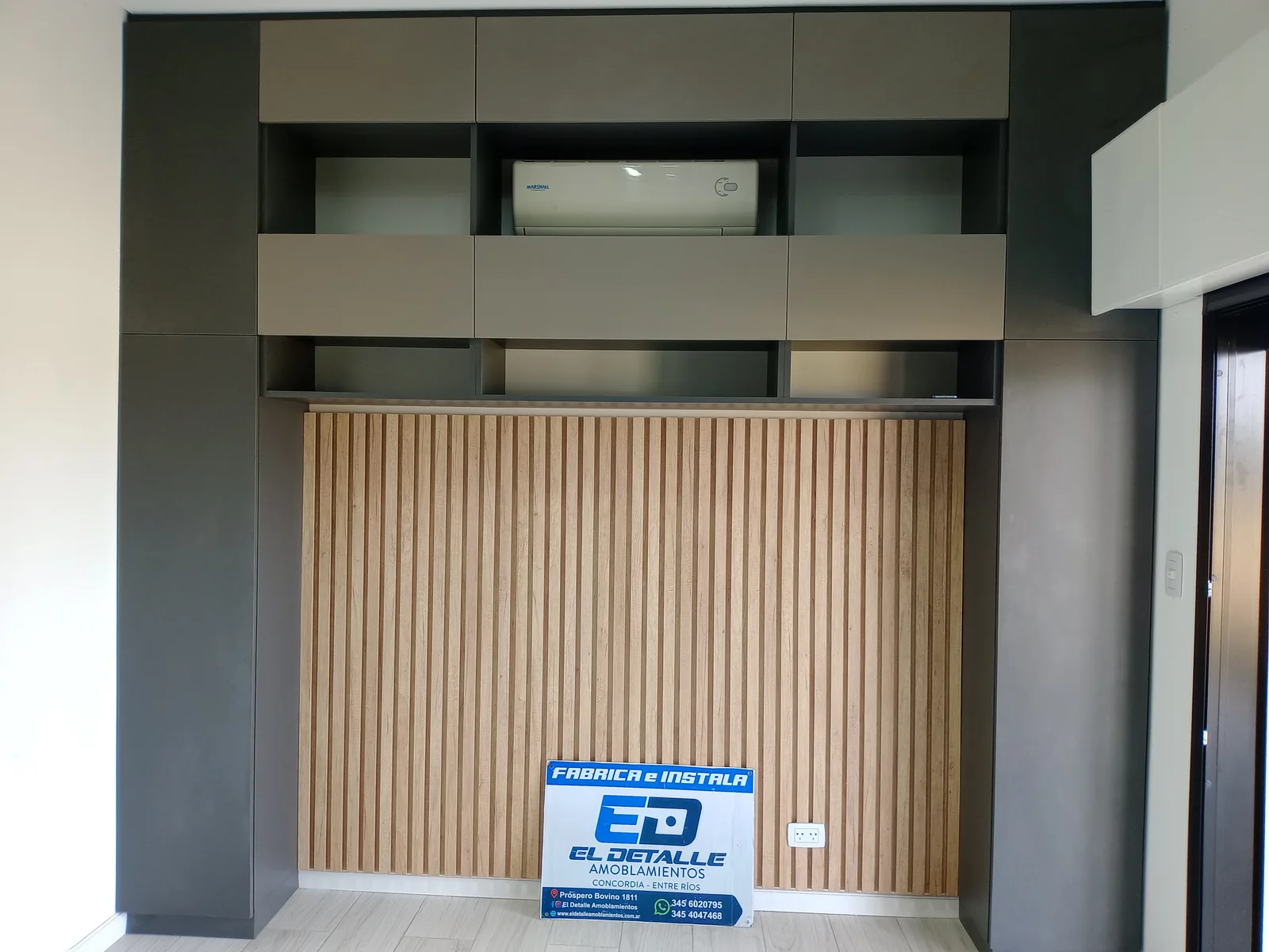 Obra terminada con el cartel de El Detalle